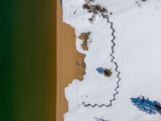 Baldwin Beach and snow on ground on Lake Tahoe. Cascade, South Lake Tahoe, California, United States of America.