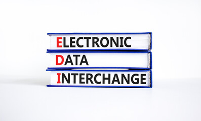 EDI electronic data interchange symbol. Concept words EDI electronic data interchange on books. beautiful white background. Business and EDI electronic data interchange concept. Copy space.