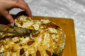 Traditional Italian desserts for Easter - Easter dove. Festive pastries with almonds and sugar icing.