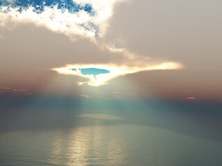 Wolkenlücke mit Sonnenstrahlen über dem Meer