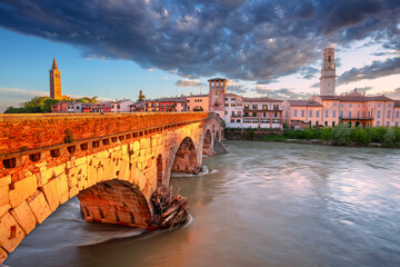 Verona, Italy. Cityscape image of beautiful Italian town Verona with the Stone Bridge over Adige...