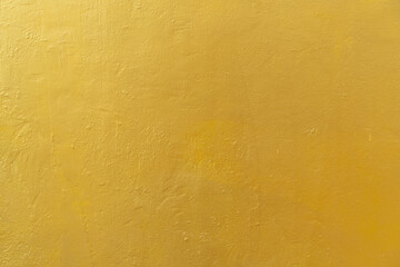 Concrete wall Gold color for abstract background, Texture background.