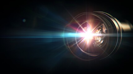 Fototapeta premium Camera lens with a radiant light flare against a dark background, symbolizing creativity and photography concepts