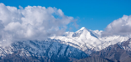 Snow-capped Himalayan mountain peaks towering over Leh in northern India