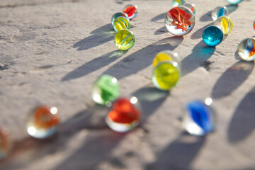 colorful marbles on the floor with backlight