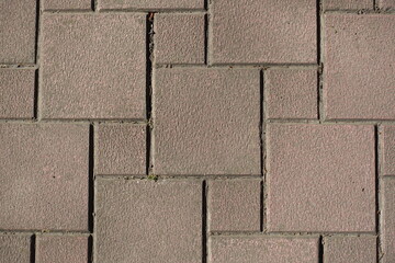 Texture of pale pink concrete pavement with hopscotch layout