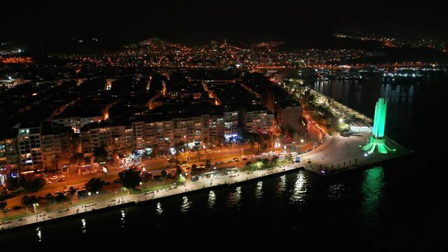 izmir karsiyaka district, sea and ferries and traffic n aerial view with drone on a sunny day. High quality 4k footage