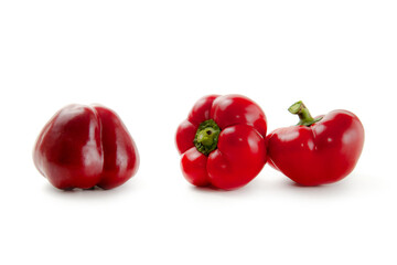 Three red bell pepper isolated on white background with clipping path. .