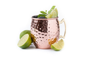 Moscow mule cocktail served with ice and lime slice isolated on white background