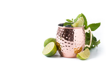 Moscow mule cocktail served with ice and lime slice isolated on white background. Copy space