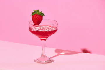 Sweet cocktail with strawberry and coconut against pink background. Relaxing vibe. Concept of alcohol and non-alcohol drink, party, holidays, bar, mix. Poster. Copy space for ad - obrazy, fototapety, plakaty