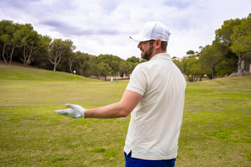 Portrait of male golfer at the golf course