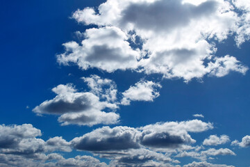 Cloudscape - Blue sky and white clouds.