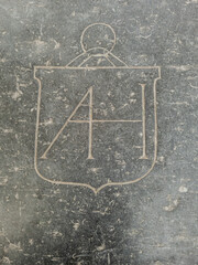 Symbol engraving on a floor slab of the Hooglandse Kerk in Leiden