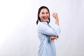Side view young strong employee business woman showing biceps muscles on hand isolated on white...
