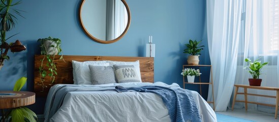 Contemporary interior of bright bedroom featuring a mirror