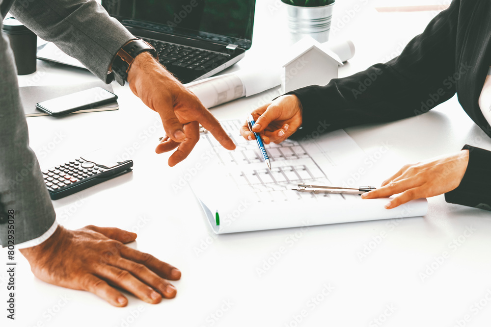 Poster architect and engineer working with construction drawing project on table in office. architecture an