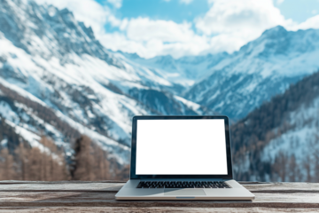 The laptop on the table with a blank screen with an ice mountains background. Mockup