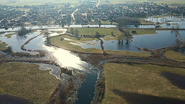 Aerial view of the spring backwaters of the Narew River in Tykocin in podlasie on a sunny day.