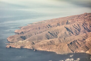 Island belonging to the Canary Islands called La Gomera in an aerial view from a plane