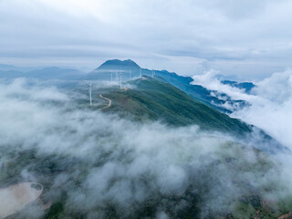 Aerial photography of mountain wind farm clouds and fog