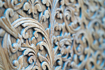 Pattern of carved pattern on wooden background