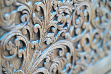Pattern of carved pattern on wooden background