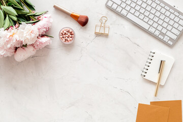 Office desktop mockup with peony flowers and female accessories, top view