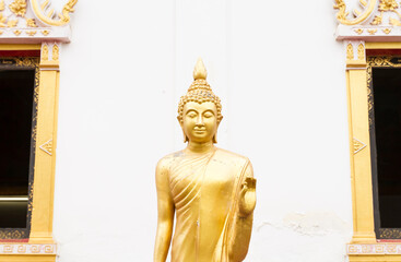 Ancient gold color Buddha statue of Thailand
