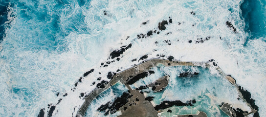 Aerial view of Porto Moniz with volcanic lava swimming pools, Madeira, Portugal