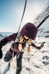 Mountaineer backcountry ski walking ski alpinist in the mountains. Ski touring in alpine landscape...