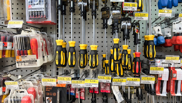 shelf with power tools in the store Ace hardware. Necessary tools for small repairs in everyday life. Bekasi, Indonesia, May 1, 2024