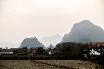 layers of mountains in the morning in Vang Vieng, the adventure capital of Laos