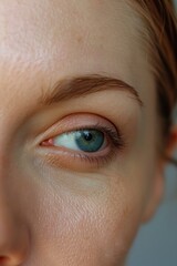 Close up of a woman's mesmerizing blue eyes, perfect for beauty or health concept designs