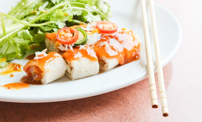 Closeup Fresh Spring rolls on a white dish