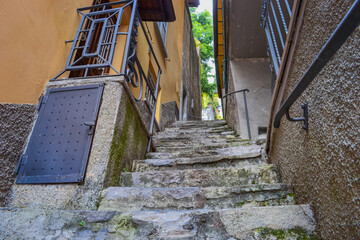 Italy, Varenna, 22.04.2024: Colorful town on Lake Como with small houses and narrow streets