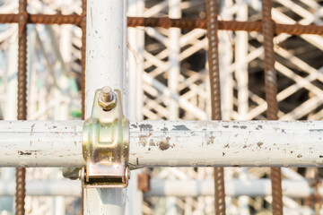 Close up installation of scaffolding for construction