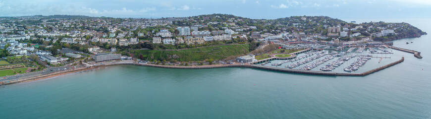 orquay seafront aerial panorama image. English riviera with cafe's, bars.Torquay marina with boats and yachts . Princess theatre.
