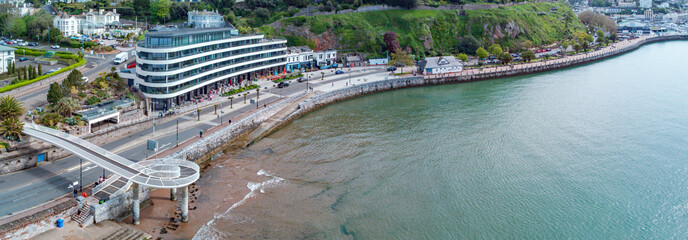 Torquay seafront aerial panorama image. English riviera with cafe's, bars.Torquay marina in the...