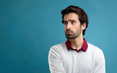 Obraz premium Portrait of a young man with anxious, worried or depressed expression