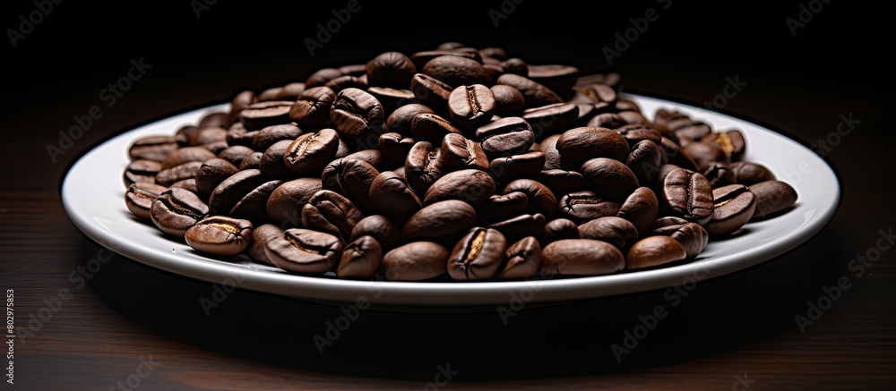 Aufkleber a close up view of dark coffee beans on a plate providing ample copy space for an image