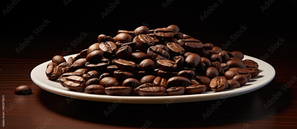 Aufkleber a close up view of dark coffee beans on a plate providing ample copy space for an image