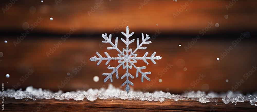 Aufkleber A close up of a snowflake captured against a rustic brown backdrop with ample space around the image for text or other elements