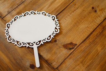 carved wooden board in white and neutral background