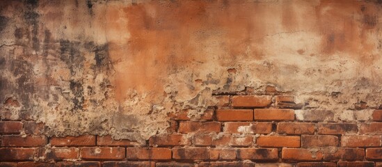A close up of a weathered brick wall with a gritty texture and ample copy space image