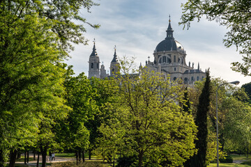 View of the Almudena Cathedral rising from the trees in Spain's capital, Madrid.