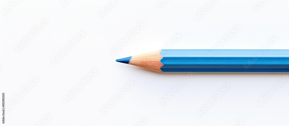 Poster a blue pencil can be seen in the middle of a white background in this copy space image
