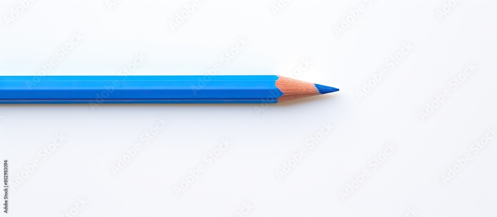 Poster a blue pencil can be seen in the middle of a white background in this copy space image