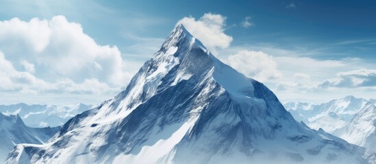 A close up image of the snowy mountain peak situated in the Europe s peaks displaying the captivating beauty of the majestic landscape with snow covered peaks. with copy space image