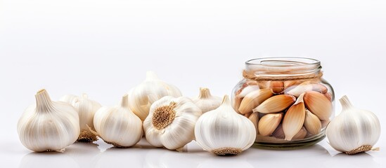 Fototapeta premium A copy space image of garlic preserved without moisture set against a plain white backdrop symbolizing its use in alternative medicine